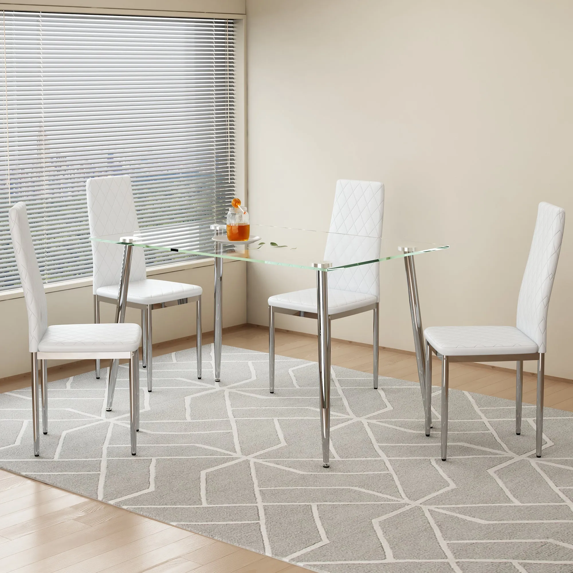 Table and chair set.Rectangular Dining Table with Tempered Glass Tabletop and Silver plating Metal Legs.Paired with 4 checkered armless high back white chairs with electroplated metal legs.