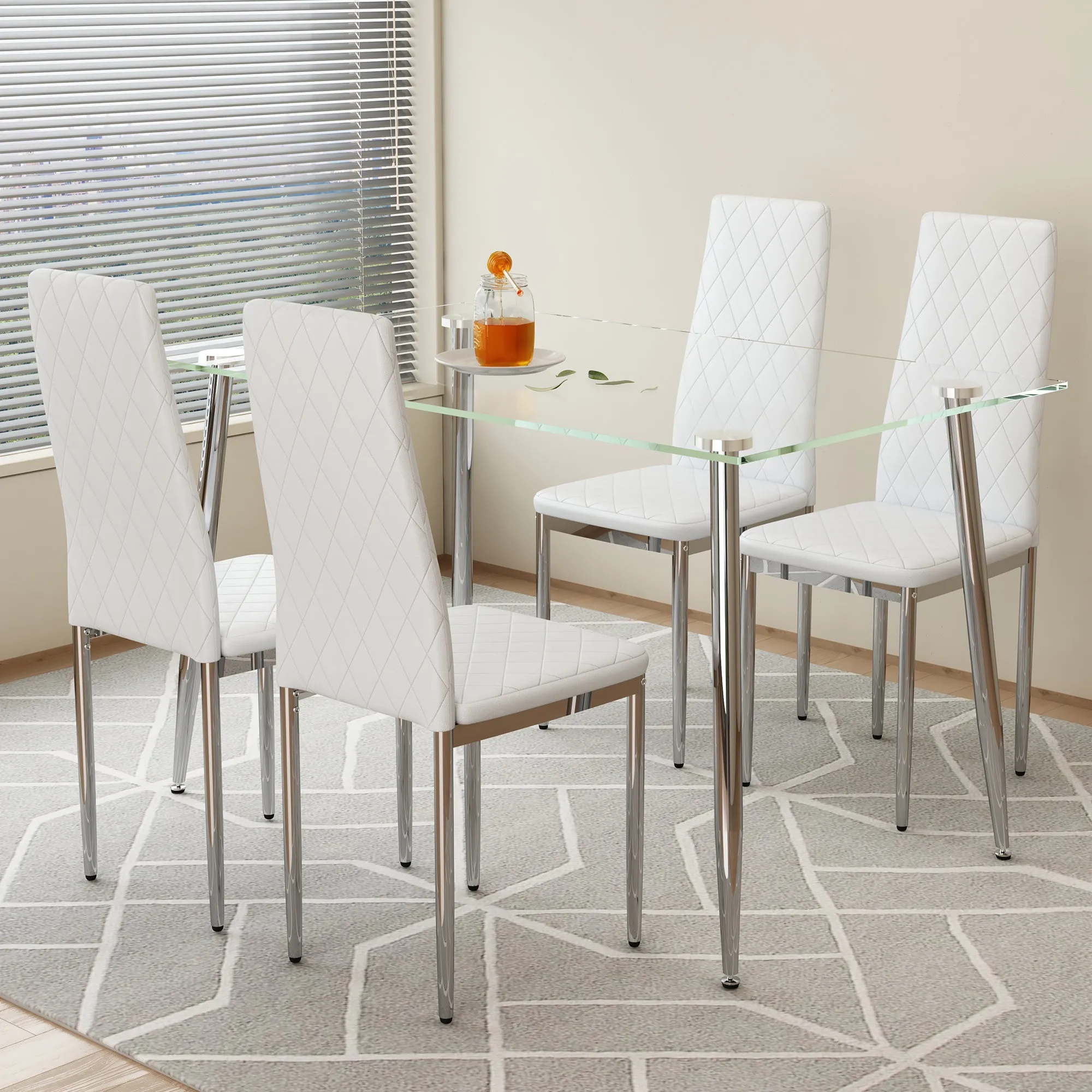 Table and chair set.Rectangular Dining Table with Tempered Glass Tabletop and Silver plating Metal Legs.Paired with 4 checkered armless high back white chairs with electroplated metal legs.