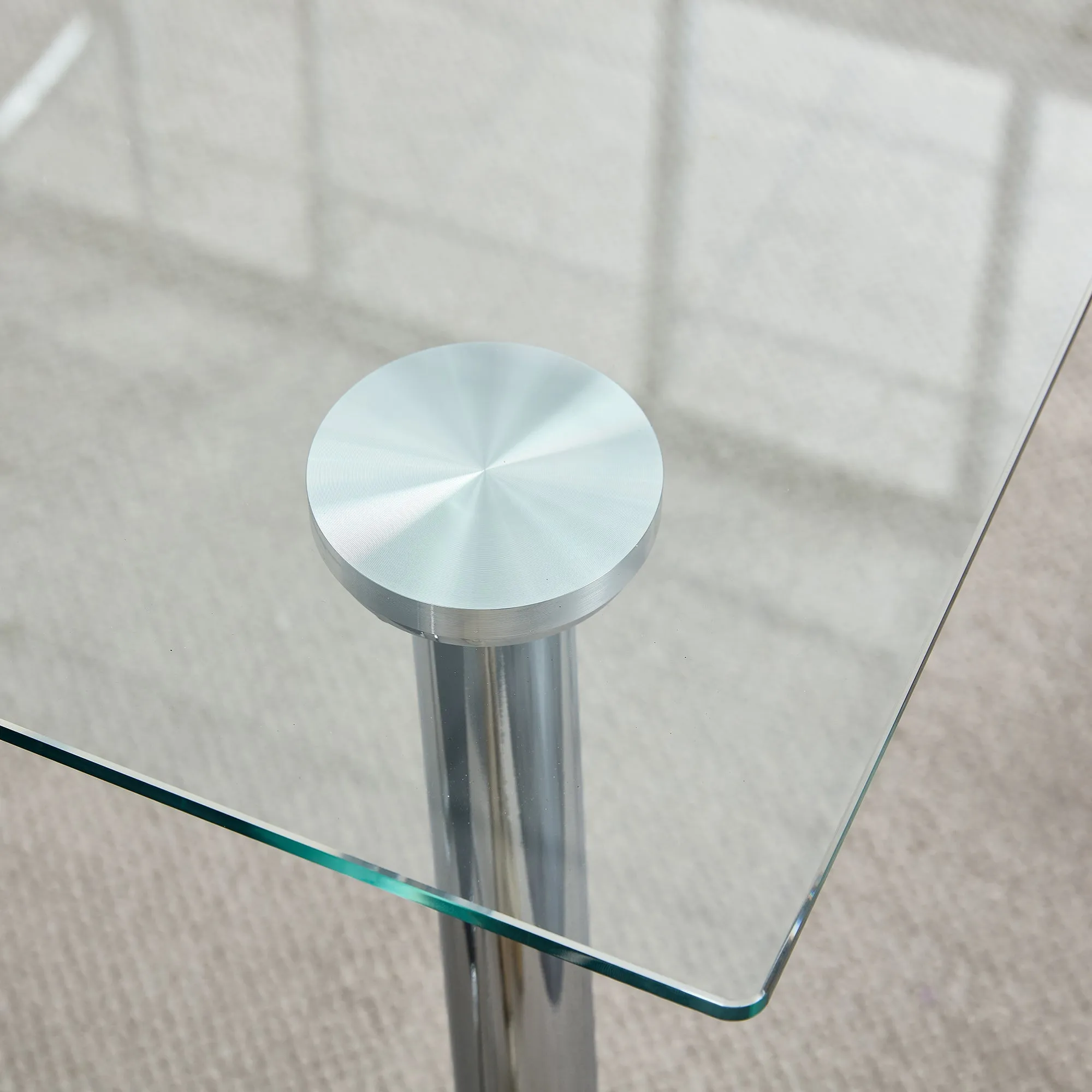 Table and chair set.Rectangular Dining Table with Tempered Glass Tabletop and Silver plating Metal Legs.Paired with 4 checkered armless high back white chairs with electroplated metal legs.